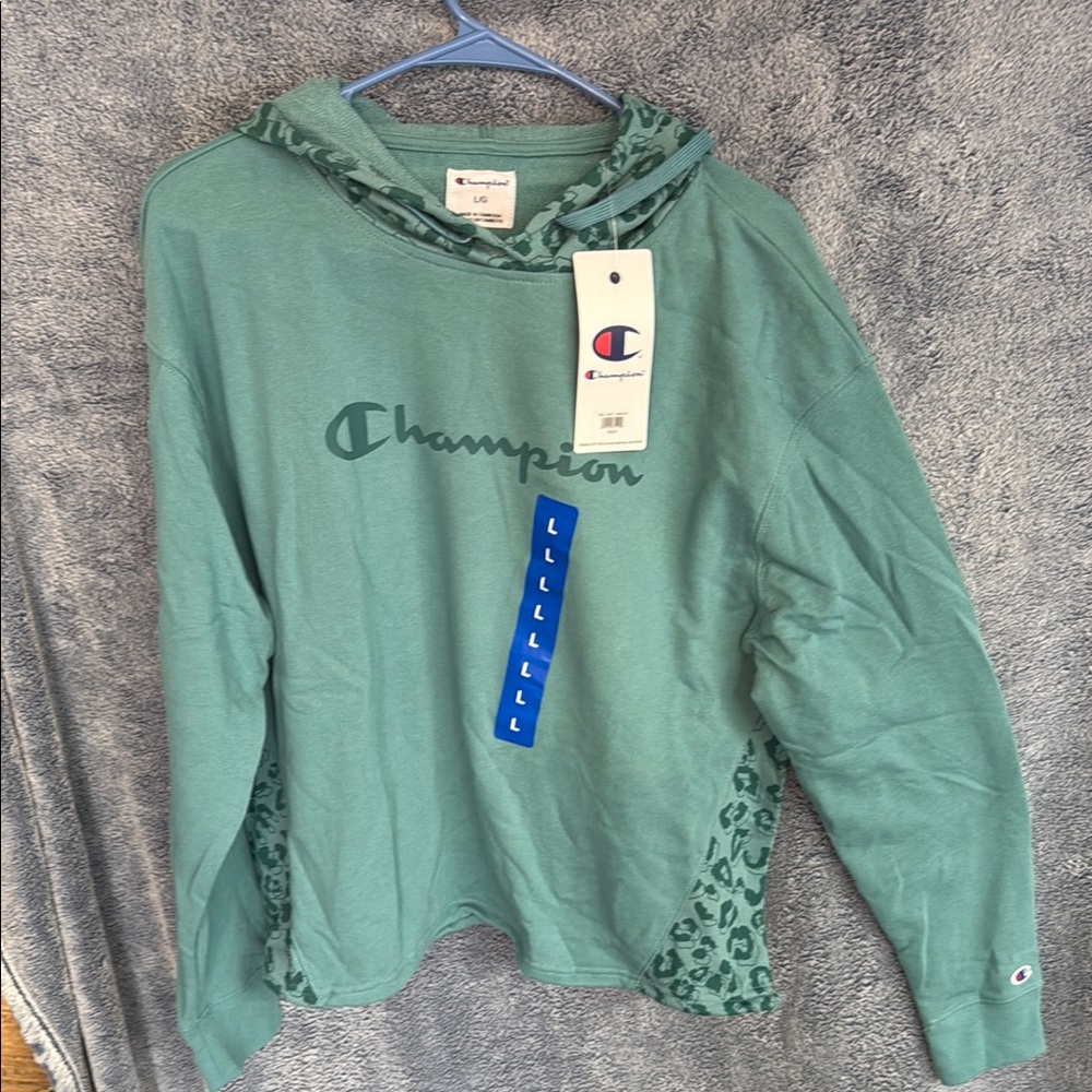 Champion Green Hoodie with Leopard Accents